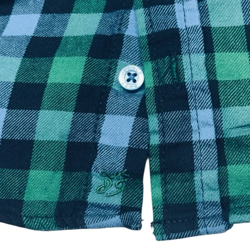 Cozy flannel button-up shirt from The Children’s Place, size 6–9 months.